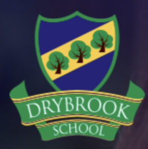 Drybrook school logo, a blue shield with a green border with a yellow diagonal band containing three trees with brown trunks and green tops